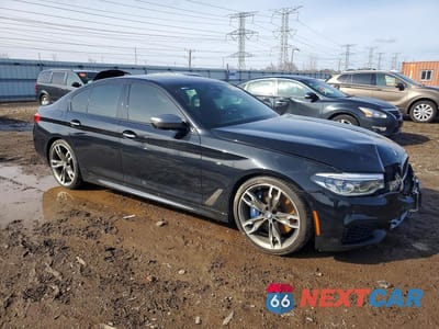 Czwarte zdjęcie samochodu z boku: 2018 BMW M550XI VIN:WBAJB9C53JB036472 - miniatura