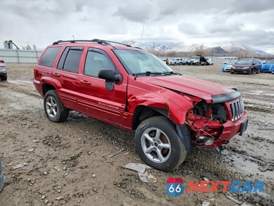 Czwarte zdjęcie samochodu z boku: 2002 JEEP GRAND CHEROKEE LIMITED VIN:1J4GW58J12C281213 - miniatura