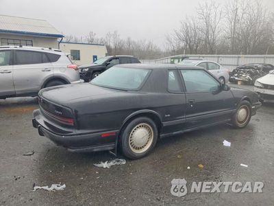 Trzecie zdjęcie samochodu z tyłu: 1990 OLDSMOBILE TORONADO TROFEO VIN:1G3EV13C4LU310796 - miniatura