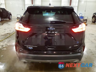 Zdjęcie 6 z 12 samochodu: 2022 FORD EDGE TITANIUM VIN:2FMPK4K92NBB05832 - miniatura