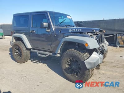 Czwarte zdjęcie samochodu z boku: 2017 JEEP WRANGLER SPORT VIN:1C4AJWAG4HL657605 - miniatura