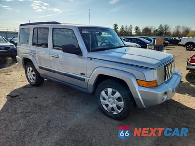 Czwarte zdjęcie samochodu z boku: 2007 JEEP COMMANDER VIN:1J8HG48K87C647551 - miniatura