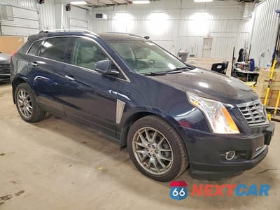 Czwarte zdjęcie samochodu z boku: 2014 CADILLAC SRX PREMIUM COLLECTION VIN:3GYFNGE35ES580508 - miniatura