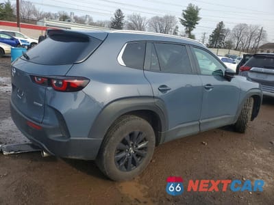 Trzecie zdjęcie samochodu z tyłu: 2024 MAZDA CX-50 SELECT VIN:7MMVABAMXRN155820 - miniatura