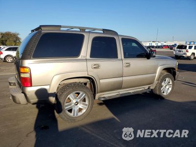 Trzecie zdjęcie samochodu z tyłu: 2001 CHEVROLET TAHOE K1500 VIN:1GNEK13T01R208606 - miniatura