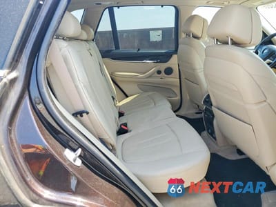 Zdjęcie 11 z 13 samochodu: 2014 BMW X5 XDRIVE50I VIN:5UXKR6C5XE0J73619 - miniatura