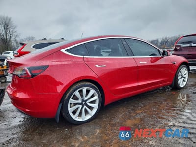 Trzecie zdjęcie samochodu z tyłu: 2018 TESLA MODEL 3 VIN:5YJ3E1EBXJF065438 - miniatura