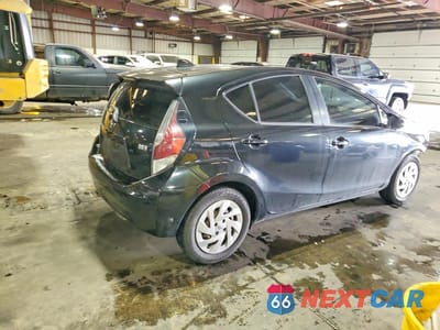 Trzecie zdjęcie samochodu z tyłu: 2016 TOYOTA PRIUS C TWO VIN:JTDKDTB36G1122131 - miniatura