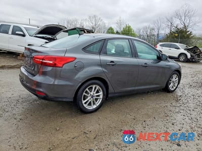 Trzecie zdjęcie samochodu z tyłu: 2017 FORD FOCUS SE VIN:1FADP3F2XHL208460 - miniatura