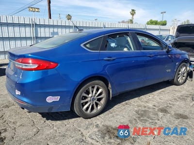 Trzecie zdjęcie samochodu z tyłu: 2017 FORD FUSION SE PHEV VIN:3FA6P0PU4HR409778 - miniatura