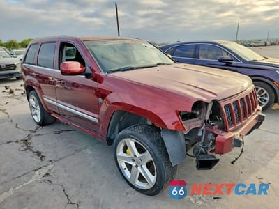 Czwarte zdjęcie samochodu z boku: 2008 JEEP GRAND CHEROKEE SRT-8 VIN:1J8HR78358C117088 - miniatura
