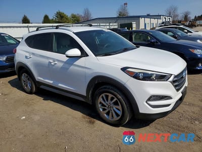 Czwarte zdjęcie samochodu z boku: 2018 HYUNDAI TUCSON VIN:KM8J3CA47JU623166 - miniatura