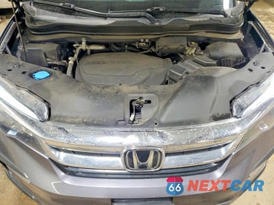 Zdjęcie 12 z 13 samochodu: 2021 HONDA PILOT EXL VIN:5FNYF6H5XMB066664 - miniatura
