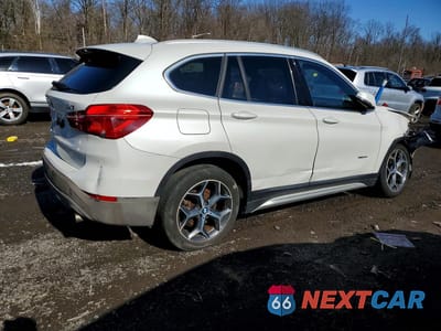 Trzecie zdjęcie samochodu z tyłu: 2018 BMW X1 XDRIVE28I VIN:WBXHT3C37J5K30028 - miniatura