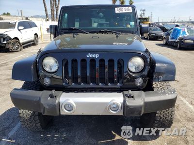 Piąte zdjęcie samochodu w środku: 2015 JEEP WRANGLER UNLIMITED SAHARA VIN:1C4BJWEG3FL530761 - miniatura