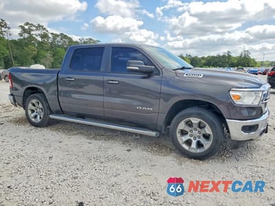 Czwarte zdjęcie samochodu z boku: 2020 RAM 1500 BIG HORN VIN:1C6RREFT1LN129083 - miniatura
