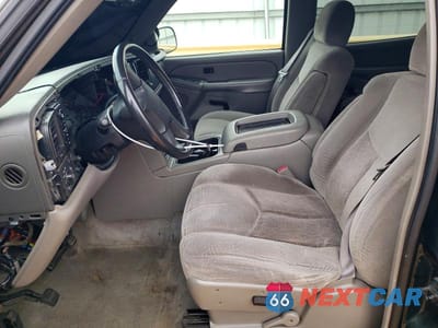 Zdjęcie 7 z 12 samochodu: 2004 CHEVROLET TAHOE K1500 VIN:1GNEK13T84J121068 - miniatura