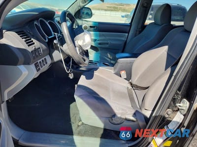 Zdjęcie 7 z 12 samochodu: 2013 TOYOTA TACOMA V6 VIN:3TMLU4ENXDM120310 - miniatura