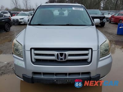 Piąte zdjęcie samochodu w środku: 2006 HONDA PILOT EX VIN:2HKYF18776H548338 - miniatura