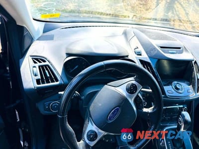 Zdjęcie 7 z 10 samochodu: 2014 FORD ESCAPE TITANIUM VIN:1FMCU9J98EUA54984 - miniatura