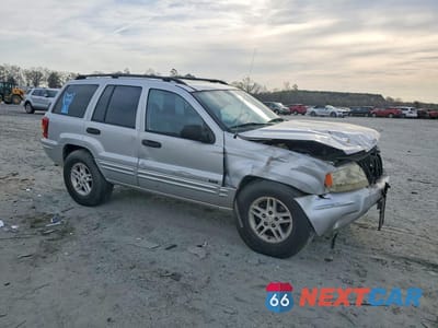 Czwarte zdjęcie samochodu z boku: 2004 JEEP GRAND CHEROKEE LAREDO VIN:1J4GX48S14C204912 - miniatura