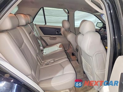 Zdjęcie 11 z 14 samochodu: 2004 CADILLAC SRX VIN:1GYEE637X40191204 - miniatura