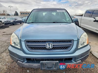Piąte zdjęcie samochodu w środku: 2005 HONDA PILOT EXL VIN:2HKYF18565H535366 - miniatura