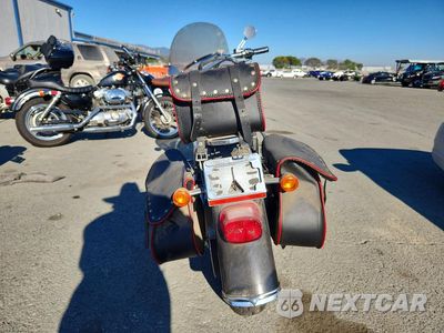 Czwarte zdjęcie samochodu z boku: 2002 HARLEY DAVIDSON FLSTFI VIN:1HD1BXB312Y052836 - miniatura