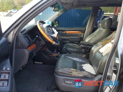 Zdjęcie 7 z 13 samochodu: 2004 LEXUS GX 470 BASE VIN:JTJBT20X140034069 - miniatura