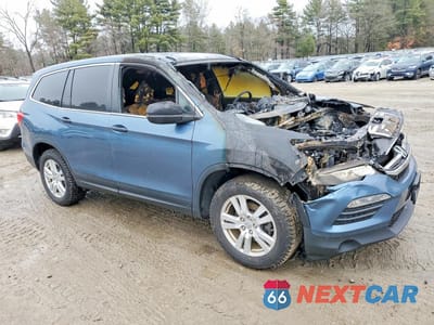 Czwarte zdjęcie samochodu z boku: 2018 HONDA PILOT LX VIN:5FNYF6H1XJB023063 - miniatura