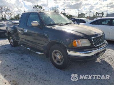 Czwarte zdjęcie samochodu z boku: 2001 FORD F150 VIN:2FTRX07L81CA15889 - miniatura