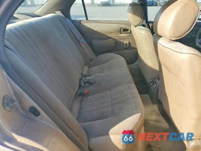 Zdjęcie 10 z 12 samochodu: 1997 TOYOTA COROLLA VIN:1NXBA02E9VZ659043 - miniatura
