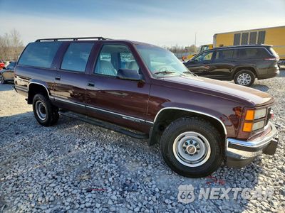 Czwarte zdjęcie samochodu z boku: 1994 GMC SUBURBAN C2500 VIN:1GKGC26F2RJ723065 - miniatura