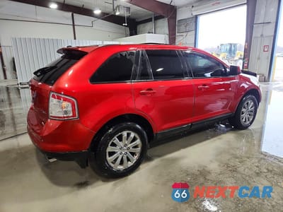 Trzecie zdjęcie samochodu z tyłu: 2010 FORD EDGE SEL VIN:2FMDK3JC4ABA20043 - miniatura