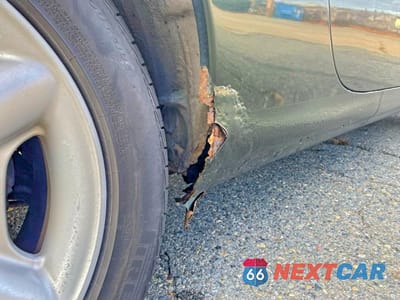 Zdjęcie 13 z 14 samochodu: 1997 JAGUAR XK8 VIN:SAJGX2748VC006585 - miniatura