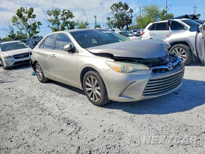 Czwarte zdjęcie samochodu z boku: 2016 TOYOTA CAMRY XLE VIN:4T4BF1FK9GR552560 - miniatura