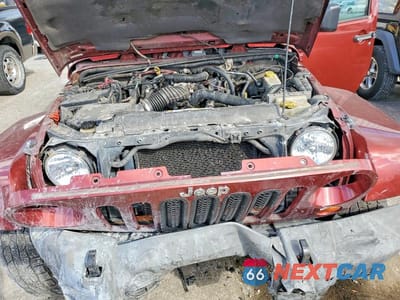 Zdjęcie 12 z 13 samochodu: 2007 JEEP WRANGLER SAHARA VIN:1J8GA59167L195303 - miniatura
