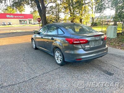 Trzecie zdjęcie samochodu z tyłu: 2017 FORD FOCUS S VIN:1FADP3E21HL263221 - miniatura