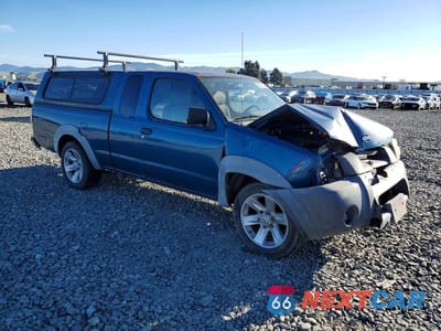 Czwarte zdjęcie samochodu z boku: 2001 NISSAN FRONTIER XE VIN:1N6DD26S51C333978 - miniatura