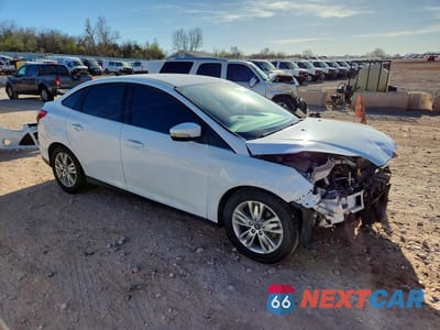 Czwarte zdjęcie samochodu z boku: 2012 FORD FOCUS SEL VIN:1FAHP3H2XCL393469 - miniatura