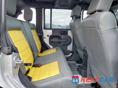 Zdjęcie 10 z 12 samochodu: 2008 JEEP WRANGLER UNLIMITED SAHARA VIN:1J8GA59198L521936 - miniatura