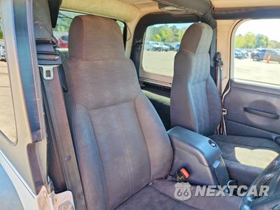 Zdjęcie 10 z 12 samochodu: 2004 JEEP WRANGLER / TJ SPORT VIN:1J4F449S24P767091 - miniatura
