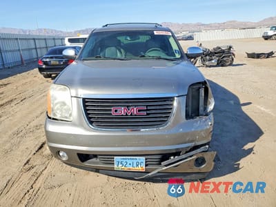 Piąte zdjęcie samochodu w środku: 2009 GMC YUKON SLT VIN:1GKFC33J89R141175 - miniatura