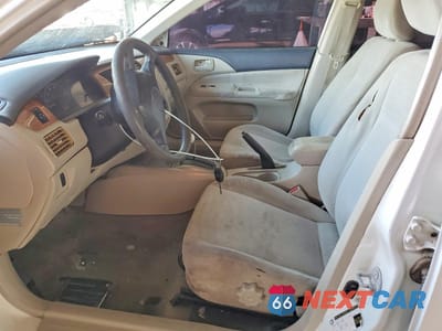 Zdjęcie 7 z 13 samochodu: 2004 MITSUBISHI LANCER ES VIN:JA3AJ26E04U035084 - miniatura