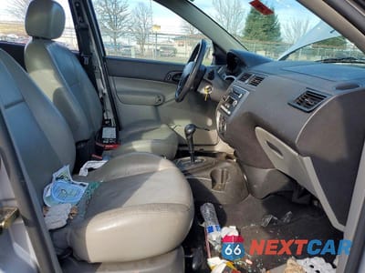 Zdjęcie 7 z 12 samochodu: 2005 FORD FOCUS ZX5 VIN:3FAFP37NX5R150378 - miniatura