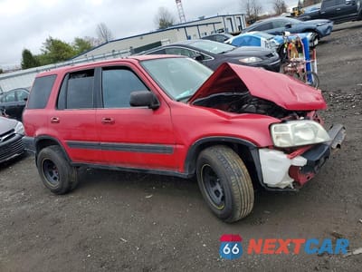 Czwarte zdjęcie samochodu z boku: 2001 HONDA CR-V EX VIN:JHLRD18601C041967 - miniatura