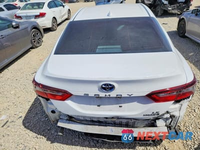 Zdjęcie 6 z 13 samochodu: 2021 TOYOTA CAMRY HYBRID LE VIN:4T1C31AK6MU552817 - miniatura