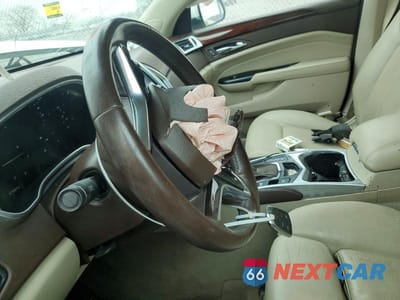 Zdjęcie 7 z 12 samochodu: 2015 CADILLAC SRX PERFORMANCE COLLECTION VIN:3GYFNCE3XFS581289 - miniatura