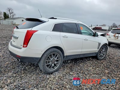 Trzecie zdjęcie samochodu z tyłu: 2015 CADILLAC SRX PERFORMANCE COLLECTION VIN:3GYFNCE3XFS581289 - miniatura