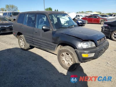 Czwarte zdjęcie samochodu z boku: 2000 TOYOTA RAV4 BASE VIN:JT3GP10V3Y0051035 - miniatura